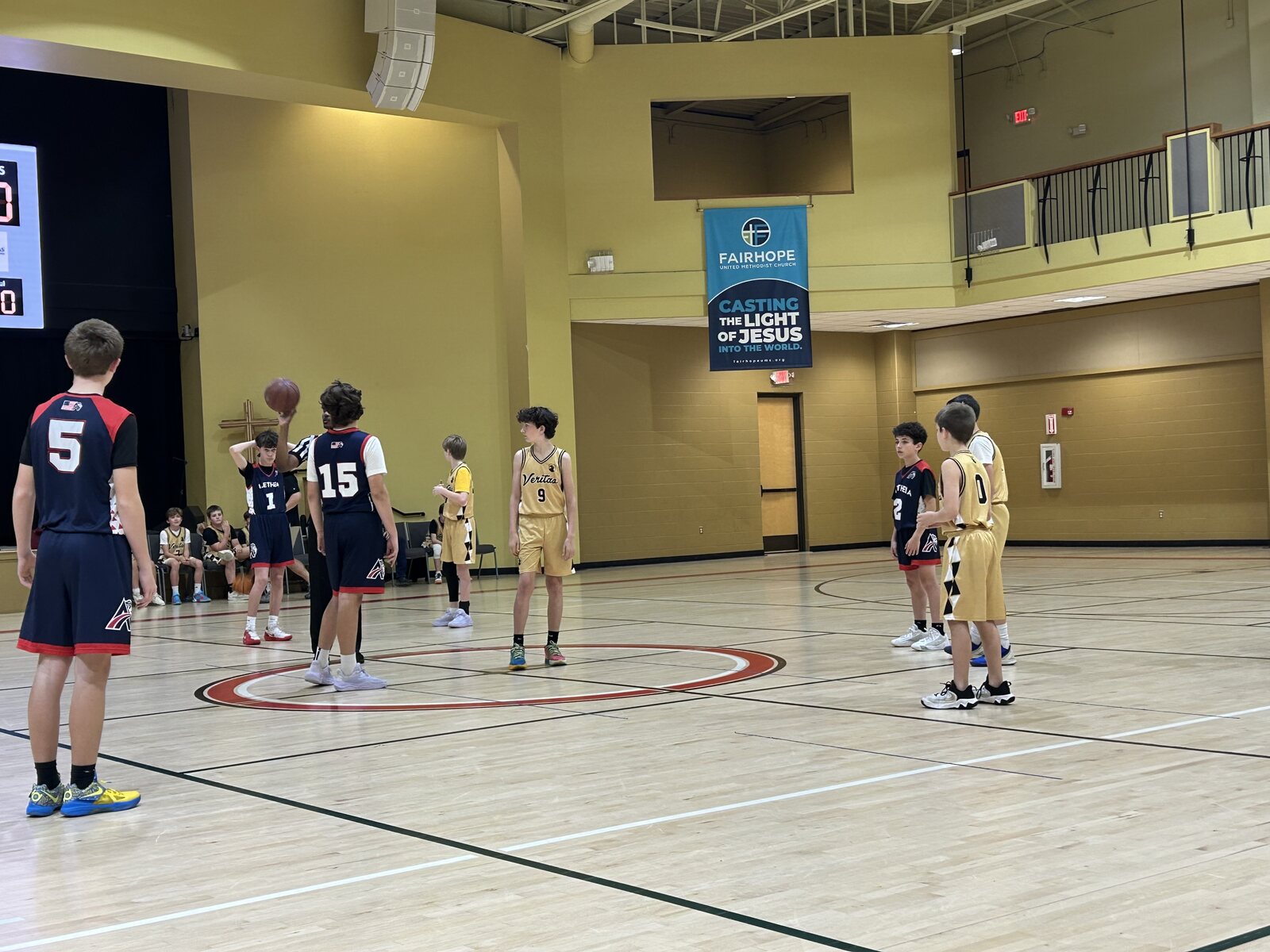 Veritas students competing in a basketball game