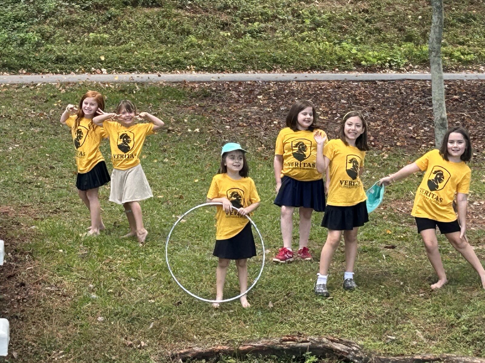 Veritas students playing together outdoors